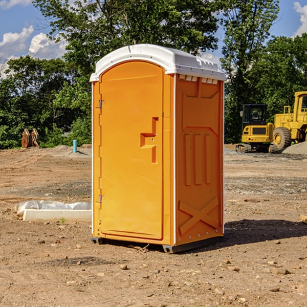 what is the cost difference between standard and deluxe portable toilet rentals in Albert City